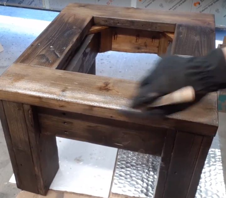 Outdoor Coffee Table with Ice Bucket adding final coats of Spar Urethane