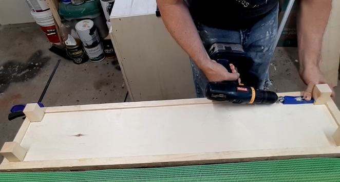 Attaching the bottom shelf to the legs