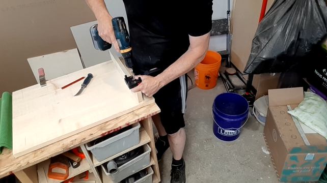 Paul using a dowel jig for extra strength